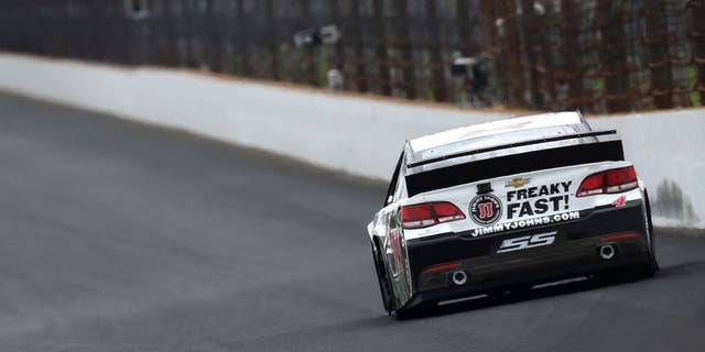 INDIANAPOLIS, IN - JULY 26: Kevin Harvick drives the #4 Jimmy John's/Budweiser Chevrolet during the NASCAR Sprint Cup Series Crown Royal Presents the Jeff Kyle 400 at the Brickyard at Indianapolis Motor Speedway on July 26, 2015 in Indianapolis, Indiana. (Photo by Brian Lawdermilk/Getty Images)