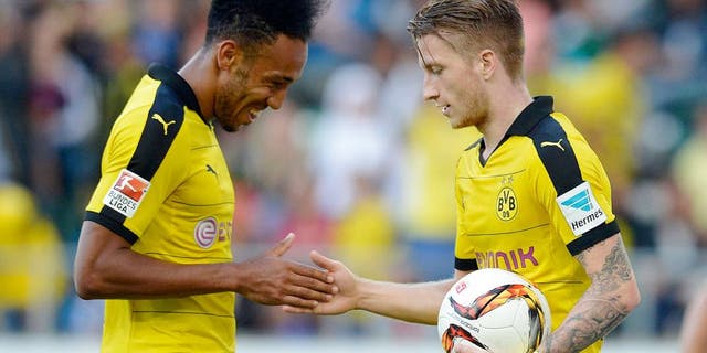 ST GALLEN, SWITZERLAND - JULY 25: Marco Reus of Dortmund (R) celebrates his team's second goal with team mate Pierre-Emerick Aubameyang during the friendly match between Juventus and Borussia Dortmund on July 25, 2015 in St Gallen, Switzerland. (Photo by Daniel Kopatsch/Getty Images)