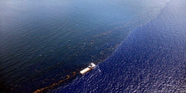 July 26: A response vessel is seen along a line of emulsified oil between the Deepwater Horizon oil spill site and the Louisiana coast in the Gulf of Mexico.