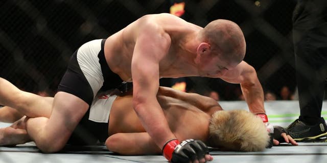 CHICAGO, IL - JULY 25: Joe Lauzon (top) fights Takanori Gomiin their lightweight bout during the UFC event at the United Center on July 25, 2015 in Chicago, Illinois. (Photo by Rey Del Rio/Zuffa LLC/Zuffa LLC via Getty Images)
