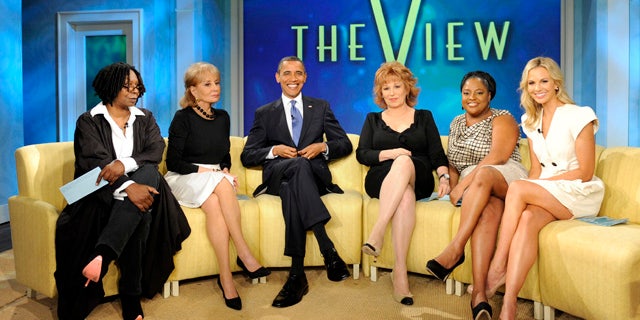 July 28: In this publicity image released by ABC, President Obama joins the co-hosts, from left, Whoopi Goldberg, Barbara Walters, Joy Behar, Sherri Shepherd and Elisabeth Hasselbeck on the set of the ABC daytime talk show "The View."