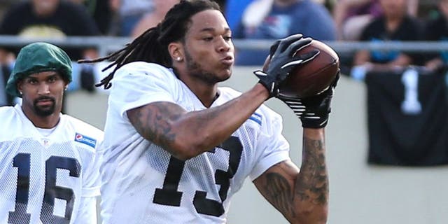 Jul 26, 2014; Spartanburg, SC, USA; Carolina Panthers wide receiver Kelvin Benjamin (13) makes a catch during training camp at Gibbs Stadium. Mandatory Credit: Jim Dedmon-USA TODAY Sports