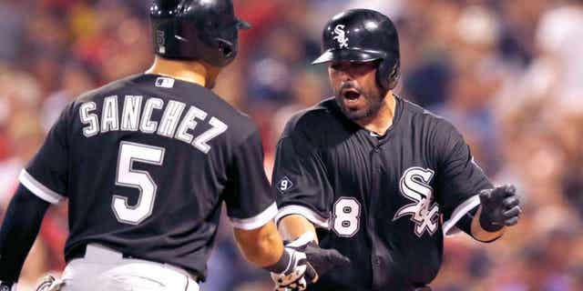 Jul 28, 2015; Boston, MA, USA; Chicago White Sox catcher Geovany Soto (58) is congratulated second baseman Carlos Sanchez (5) after hitting a home run during the seventh inning at Fenway Park. Mandatory Credit: Greg M. Cooper-USA TODAY Sports