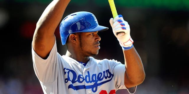 WASHINGTON, DC - JULY 18: Yasiel Puig #66 of the Los Angeles Dodgers bats against the Washington Nationals at Nationals Park on July 18, 2015 in Washington, DC. (Photo by G Fiume/Getty Images)