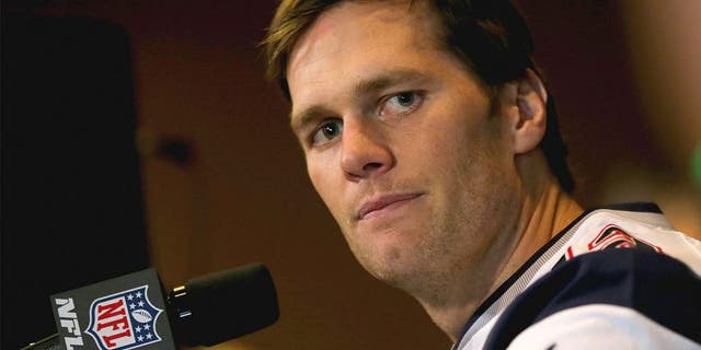 CHANDLER, AZ - JANUARY 28: Quarterback Tom Brady #12 of the New England Patriots speaks with the media on January 28, 2015 in Chandler, Arizona. (Photo by Elsa/Getty Images)