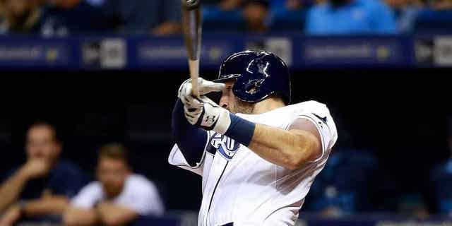 Jul 28, 2015; St. Petersburg, FL, USA; Tampa Bay Rays catcher Curt Casali (19) hits a two-run home run during the fourth inning against the Detroit Tigers at Tropicana Field. Mandatory Credit: Kim Klement-USA TODAY Sports