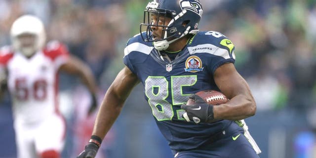 SEATTLE, WA - DECEMBER 09: Tight end Anthony McCoy #85 of the Seattle Seahawks rushes on a 67 yard pass play against the Arizona Cardinals at CenturyLink Field on December 9, 2012 in Seattle, Washington. The Seahawks defeated the Cardinals 58-0. (Photo by Otto Greule Jr/Getty Images)