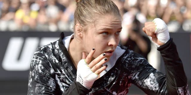 RIO DE JANEIRO, BRAZIL - JULY 29: Womens bantamweight champion Ronda Rousey of the United States holds an open training session at Pepe Beach on July 29, 2015 in Rio de Janeiro, Brazil. (Photo by Buda Mendes/Zuffa LLC/Zuffa LLC via Getty Images)