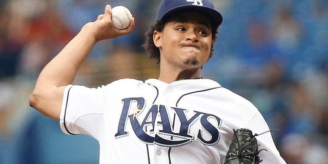 ST. PETERSBURG, FL - JULY 29: Chris Archer #22 of the Tampa Bay Rays pitches during the first inning of a game against the Detroit Tigers on July 29, 2015 at Tropicana Field in St. Petersburg, Florida. (Photo by Brian Blanco/Getty Images)