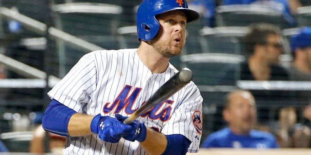 New York Mets' Lucas Duda watches his ninth-inning solo home run during a baseball game against the San Diego Padres in New York, Wednesday, July 29, 2015. The Padres won 7-3. (AP Photo/Kathy Willens)