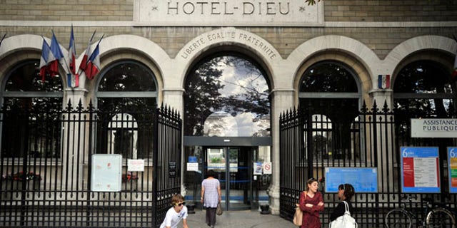 July 30: Exterior view of the Hotel Dieu hospital in Paris, where two employees of the U.S. embassy were undergoing medical tests after handling a suspicious letter.