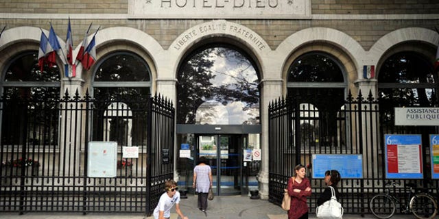July 30: Exterior view of the Hotel Dieu hospital in Paris, where two employees of the U.S. embassy were undergoing medical tests after handling a suspicious letter.
