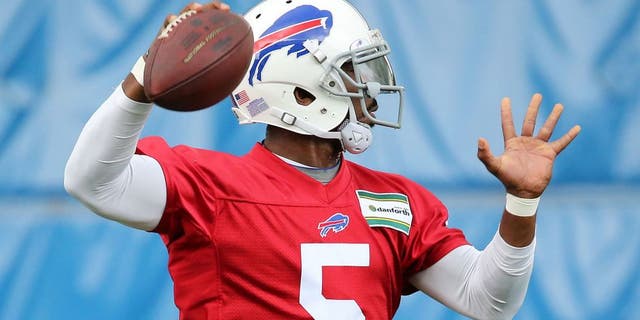 May 26, 2015; Orchard Park, NY, USA; Buffalo Bills quarterback Tyrod Taylor (5) throws a pass during the organized team activities at the ADPRO Sports Training Center. Mandatory Credit: Kevin Hoffman-USA TODAY Sports
