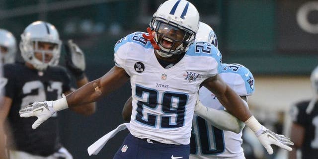 November 24, 2013; Oakland, CA, USA; Tennessee Titans cornerback Blidi Wreh-Wilson (29) celebrates after a defensive stop during the fourth quarter against the Oakland Raiders at O.co Coliseum. The Titans defeated the Raiders 23-19. Mandatory Credit: Kyle Terada-USA TODAY Sports