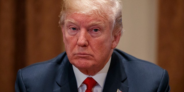 President Donald Trump listens during a meeting with law enforcement officials on the MS-13 street gang and border security, in the Cabinet Room of the White House, Tuesday, Feb. 6, 2018, in Washington. (AP Photo/Evan Vucci)