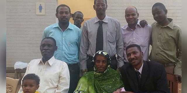 Meriam Ibrahim, with husband Daniel Wani and children Martin and Maya along with their legal team following her release from a Karthoum prison.
