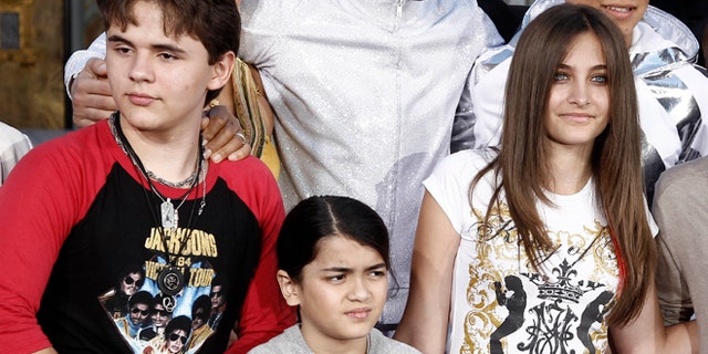 Jan. 26, 2012: This file photo shows, from left, Prince Jackson, Blanket Jackson and Paris Jackson after a hand and footprint ceremony honoring their father musician Michael Jackson in front of Grauman's Chinese Theatre in Los Angeles.