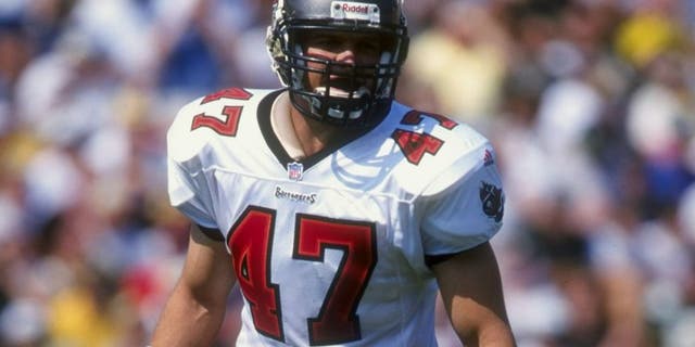 13 Sep 1998: John Lynch #47 of the Tampa Bay Buccaneers looks on during the game against the Green Bay Packers at Lambeau Field in Green Bay, Wisconsin. The Packers defeated the Buccaneers 23-15.