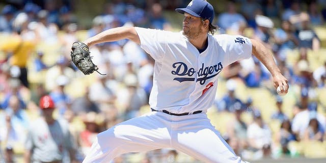 LOS ANGELES, CA - AUGUST 01: Clayton Kershaw #22 of the Los Angeles Dodgers pitches to the Los Angeles Angels during the first inning at Dodger Stadium on August 1, 2015 in Los Angeles, California. (Photo by Harry How/Getty Images)