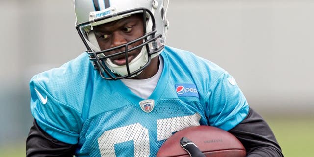 In this June 4, 2015, photo Carolina Panthers' Stephen Hill runs after a catch during an NFL football organized team activity in Charlotte, N.C. Hill has been cited for knowingly possessing drug paraphernalia with intent to use. Concord Police Department records indicate Hill was cited Tuesday near Charlotte Motor Speedway for possessing two grinders with marijuana residue and a marijuana bowl used to process, prepare and store. Panthers players are scheduled to arrive for training camp on Thursday. (AP Photo/Chuck Burton)