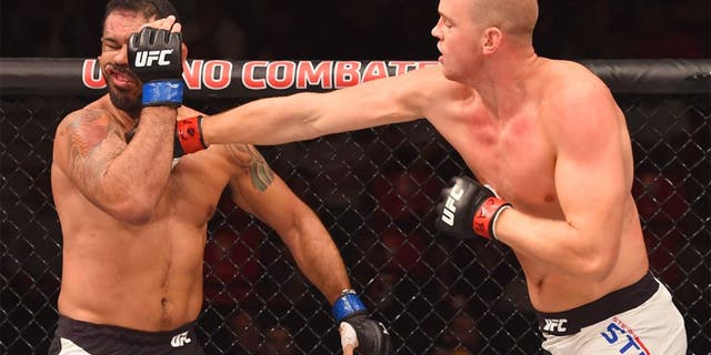 RIO DE JANEIRO, BRAZIL - AUGUST 01: (R-L) Stefan Struve of the Netherlands punches Rodrigo 'Minotauro' Nogueira of Brazil in their heavyweight bout during the UFC 190 event inside HSBC Arena on August 1, 2015 in Rio de Janeiro, Brazil. (Photo by Josh Hedges/Zuffa LLC/Zuffa LLC via Getty Images)