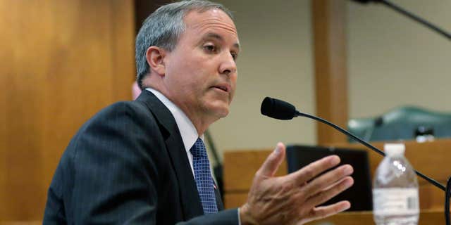 July 29, 2015: Texas Attorney General Ken Paxton speaks during a hearing in Austin, Texas.