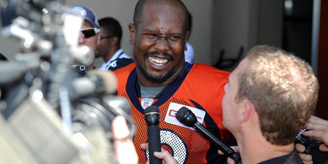 Jul 31, 2015; Englewood, CO, USA; Denver Broncos outside linebacker Von Miller (58) speaks to the media following training camp activities at the UCHealth Training Center. Mandatory Credit: Ron Chenoy-USA TODAY Sports