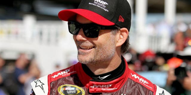 LONG POND, PA - JULY 31: Jeff Gordon, driver of the #24 AARP Member Advantages Chevrolet, looks on from the grid during qualifying for the NASCAR Sprint Cup Series Windows 10 400 at Pocono Raceway on July 31, 2015 in Long Pond, Pennsylvania. (Photo by Tim Bradbury/Getty Images)