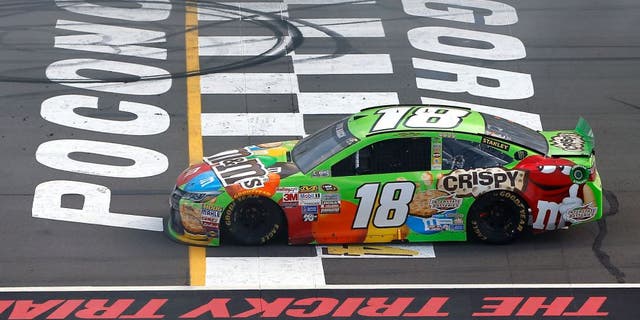 LONG POND, PA - AUGUST 02: Kyle Busch, driver of the #18 M&M's Crispy Toyota, is seen after running out of fuel in the closing laps of the NASCAR Sprint Cup Series Windows 10 400 at Pocono Raceway on August 2, 2015 in Long Pond, Pennsylvania. (Photo by Jonathan Ferrey/NASCAR via Getty Images)