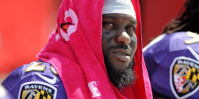 TAMPA, FL - OCTOBER 12: Strong safety Matt Elam #26 of the Baltimore Ravens sits on the sidelines against the Tampa Bay Buccaneers at Raymond James Stadium on October 12, 2014 in Tampa, Florida. (Photo by Cliff McBride/Getty Images)