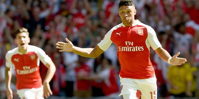 LONDON, ENGLAND - AUGUST 02: Alex Oxlade-Chamberlain of Arsenal celebrates scoring his side's first goal during the FA Community Shield match between Chelsea and Arsenal at Wembley Stadium on August 2, 2015 in London, England. (Photo by Michael Regan - The FA/The FA via Getty Images)