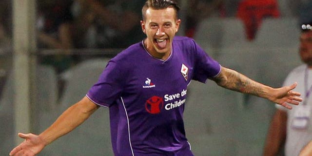 FLORENCE, ITALY - AUGUST 02: Federico Bernardeschi of ACF Fiorentina celebrates after scoring the opening goal during the preseason friendly match between ACF Fiorentina and FC Barcelona at Artemio Franchi on August 2, 2015 in Florence, Italy. (Photo by Paolo Bruno/Getty Images)