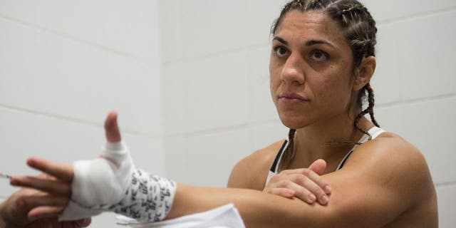 RIO DE JANEIRO, BRAZIL - AUGUST 01: Bethe Correia of Brazil gets her hands wrapped backstage during the UFC 190 event inside HSBC Arena on August 1, 2015 in Rio de Janeiro, Brazil. (Photo by Jeff Bottari/Zuffa LLC/Zuffa LLC via Getty Images)