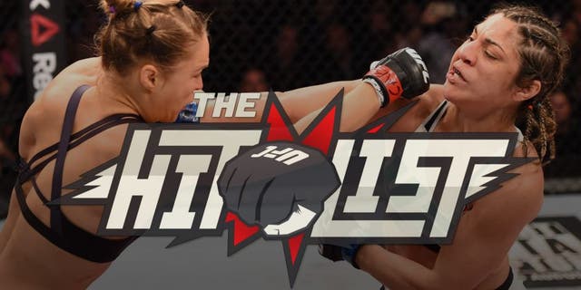 RIO DE JANEIRO, BRAZIL - AUGUST 01: (L-R) Ronda Rousey of the United States punches Bethe Correia of Brazil in their UFC women's bantamweight championship bout during the UFC 190 event inside HSBC Arena on August 1, 2015 in Rio de Janeiro, Brazil. (Photo by Josh Hedges/Zuffa LLC/Zuffa LLC via Getty Images)