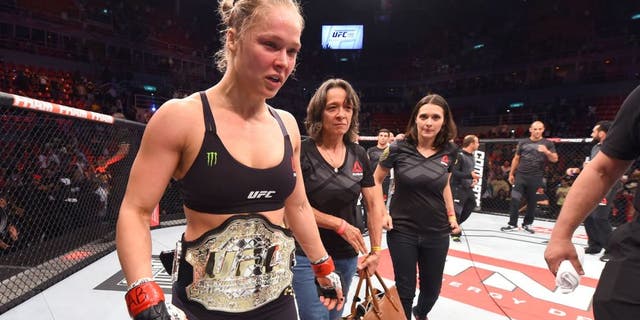 RIO DE JANEIRO, BRAZIL - AUGUST 01: Ronda Rousey of the United States celebrates her knock out victory over Bethe Correia of Brazil in the first round in their UFC women's bantamweight championship bout during the UFC 190 event inside HSBC Arena on August 1, 2015 in Rio de Janeiro, Brazil. (Photo by Josh Hedges/Zuffa LLC/Zuffa LLC via Getty Images)