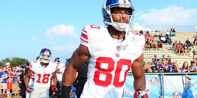 Aug 3, 2014; Canton, OH, USA; New York Giants wide receiver Victor Cruz (80) prior to the 2014 Pro Football Hall of Fame game against the Buffalo Bills at Fawcett Stadium. Mandatory Credit: Andrew Weber-USA TODAY Sports