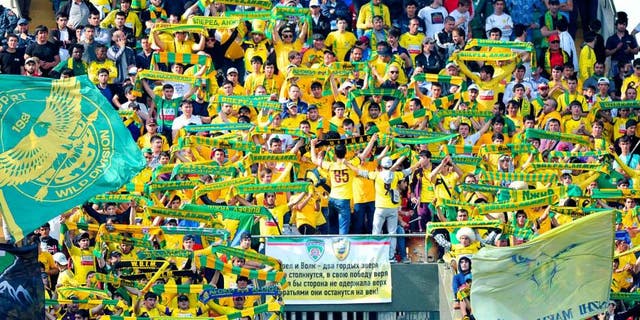 GROZNY, RUSSIA - MAY 12: FC Anzhi Makhachkala fans during the Russian Premier League match between FC Terek Grozny and FC Anzhi Makhachkala at the Akhmad-Arena Stadium on May 12, 2013 in Grozny, Russia. (Photo by Sergey Rasulov Jr/Epsilon/Getty Images)