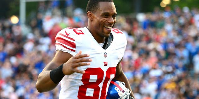 Aug 3, 2014; Canton, OH, USA; New York Giants wide receiver Victor Cruz (80) reacts prior to the 2014 Pro Football Hall of Fame game against the Buffalo Bills at Fawcett Stadium. Mandatory Credit: Andrew Weber-USA TODAY Sports