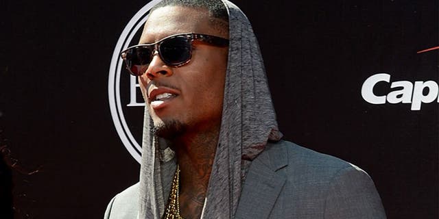 Jul 16, 2014; Los Angeles, CA, USA; San Francisco 49ers wide receiver Stevie Johnson (right) arrives at the 2014 ESPY Award show at Nokia Theatre. Mandatory Credit: Jayne Kamin-Oncea-USA TODAY Sports