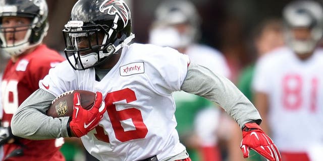 Aug 1, 2015; Atlanta, GA, USA; Atlanta Falcons wide receiver Justin Hardy (16) runs with the ball after a catch on the field during training camp at the Flowery Branch Training Facility. Mandatory Credit: Dale Zanine-USA TODAY Sports