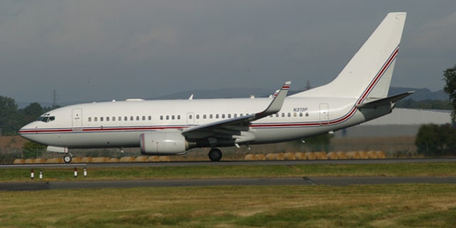 FILE: This Boeing 737, seen in Glasgow, Scotland on Sept. 7, 2003, has been identified by European investigators as a plane used for CIA rendition flights. Flight records and interviews with The Associated Press show the plane brought at least four high-value terrorists into Guantanamo Bay in 2003, years earlier than has been previously disclosed.