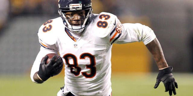 Sep 22, 2013; Pittsburgh, PA, USA; Chicago Bears tight end Martellus Bennett (83) runs after a pass reception against the Pittsburgh Steelers during the fourth quarter at Heinz Field. The Bears won 40-23. Mandatory Credit: Charles LeClaire-USA TODAY Sports