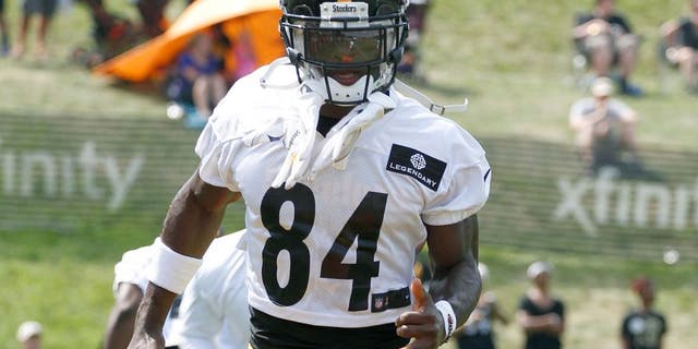 Jul 27, 2015; Latrobe, PA, USA; Pittsburgh Steelers wide receiver Antonio Brown (84) participates in drills during training camp at Saint Vincent College. Mandatory Credit: Charles LeClaire-USA TODAY Sports
