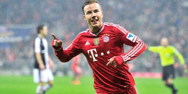 MUNICH, GERMANY - FEBRUARY 02: Mario Goetze of Muenchen celebrates his opening goal during the Bundesliga match between FC Bayern Muenchen and Eintracht Frankfurt at Allianz Arena on February 2, 2014 in Munich, Germany. (Photo by Lennart Preiss/Bongarts/Getty Images)