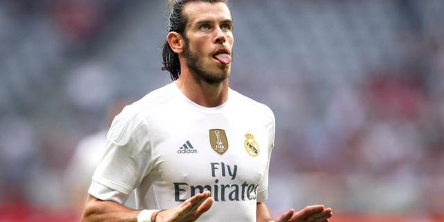 MUNICH, GERMANY - AUGUST 04: Gareth Bale of Real Madrid celebrates his goal during the semi-final match of the Audi Cup 2015 at Allianz Arena on August 4, 2015 in Munich, Germany. (Photo by Alexandra Beier/Bongarts/Getty Images)