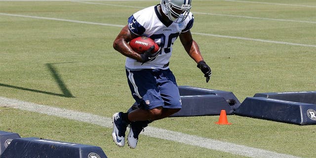 May 27, 2015; Dallas, TX, USA; Dallas Cowboys running back Darren McFadden (20) runs drills during OTAs at Dallas Cowboys Headquarters. Mandatory Credit: Matthew Emmons-USA TODAY Sports