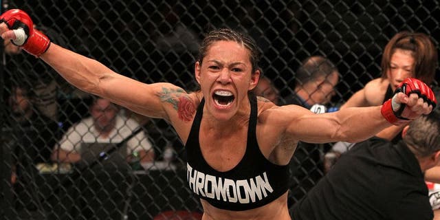 SAN DIEGO - DECEMBER 17: Cris "Cyborg" Santos reacts to her knockout victory over Hiroko Yamanaka during the Strikeforce event at the Valley View Casino Center on December 17, 2011 in San Diego, California. (Photo by Josh Hedges/Forza LLC/Forza LLC via Getty Images)