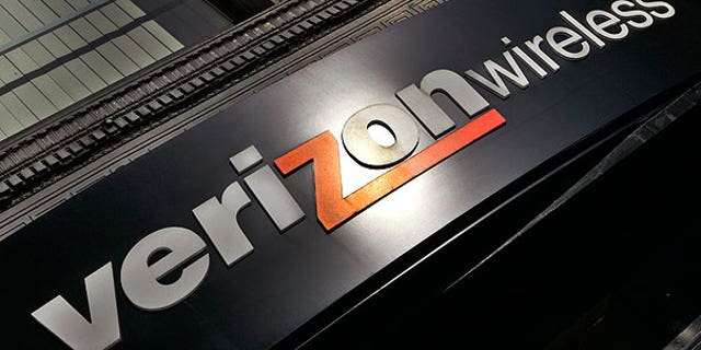 In this Oct. 30, 2006, file photo, a Verizon Wireless store sign is seen in a Portland, Ore.