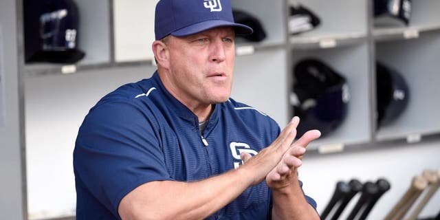 SAN DIEGO, CA - JULY 17: Interim manager Pat Murphy #24 of the San Diego Padres looks out from the dugout before a baseball game against the Colorado Rockies at Petco Park July 17, 2015 in San Diego, California. (Photo by Denis Poroy/Getty Images)