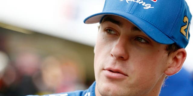 Ryan Blaney, driver of the #21 SKF Ford, stands in the garage area during practice for the NASCAR Sprint Cup Series 5-Hour Energy 301 at New Hampshire Motor Speedway on July 18, 2015 in Loudon, New Hampshire. (Photo by Jeff Zelevansky/Getty Images)